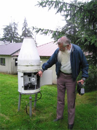 Dr. Bruce Wing taking rainfall measurements
