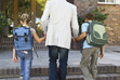 Children walking to school with parent