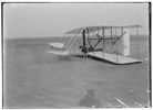  Wilbur in prone position in damaged machine on ground afterunsuccessful trial of December 14, 1903; Kitty Hawk, North Carolina 