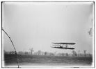  Flight 85: Orville in flight over tree tops, covering a distance of approximately 1,760 feet in 40 1/5 seconds; Huffman Prairie, Dayton, Ohio 
