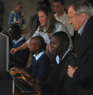 Director Tschetter (lft) observing students in the new computer lab built by the Peace Corps at the Kerugoya School for the Deaf. Peace Corps Volunteers Erin Hayba and Frank Lester (ctr from lft to rt) participate in the presentation.