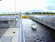 photo of boat exiting from lock