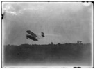  Side view of flight 45, Orville flying to the right close to the ground, covering a distance of about 14.2 miles in 25 minutes and 5 seconds; Huffman Prairie, Dayton, Ohio 
