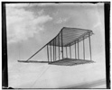  Left side view of glider flying as a kite, in level flight, Kitty Hawk, North Carolina 
