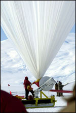 Ground crews fill a long-duration, high-altitude balloon at Williams Field, the U.S. skiway near McMurdo Station on the Ross Ice Shelf. The balloon takes advantage of the high-altitude wind currents that circle Antarctica, bringing the balloon back close to its point of origin, so that its payload can be retrieved. Instrument payload also sends data back to ground receivers. These instruments enable researchers to collect data about cosmic rays, electron precipitation from Earth's radiation belts, and other similar phenomena in near-space environments.