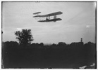  Flight 41: Orville flying to the left at a height of about 60 feet; Huffman Prairie, Dayton, Ohio 
