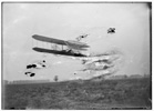  Flight 82: Wilbur piloting at a considerable height, flying a distance of 2 3/4 miles in 5 minutes and 4 seconds, almost four circles of the field at Huffman Prairie, the best and longest flight of the year; Dayton, Ohio. 

