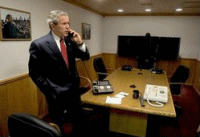 President George W. Bush speaks with Sri Lankan President Chandrika Kumaratunga during a phone call in Crawford, Texas, Wednesday, Dec. 29, 2004.