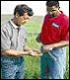 Conservationist/landowner and County Commissioner discuss conservation practices on farm near.
