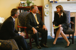 Deputy Assistant to the President and Director of USA Freedom Corps Desiree T. Sayle welcomed The National Corn Growers Association chairman Fred Yoder to the White House office of USA Freedom Corps Monday, August 2, 2004, to mark his association’s participation with Volunteers for Prosperity.  Also present, Jack Hawkins (left), director of the Office of Volunteers for Prosperity at USAID.