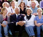 photo of Secretary Powell with Peace Corps Volunteers in Ecuador