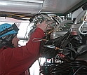 A worker takes a sensor from the shelves at the South Pole drilling site.