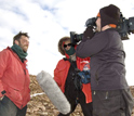 Photo of earth scientist David Marchant being interviewed in the McMurdo Dry Valleys.