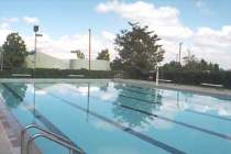 Montgomery pool with trees in the background