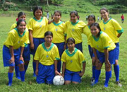 In San Pedro: Patricia (far right) and the local girls' soccer team
