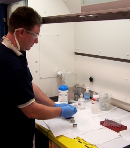 A scientist (now with Colorado State University-Pueblo) preparing samples of biosolids for extraction using accelerated solvent extraction. The samples were analyzed for a broad suite of emerging contaminants.
