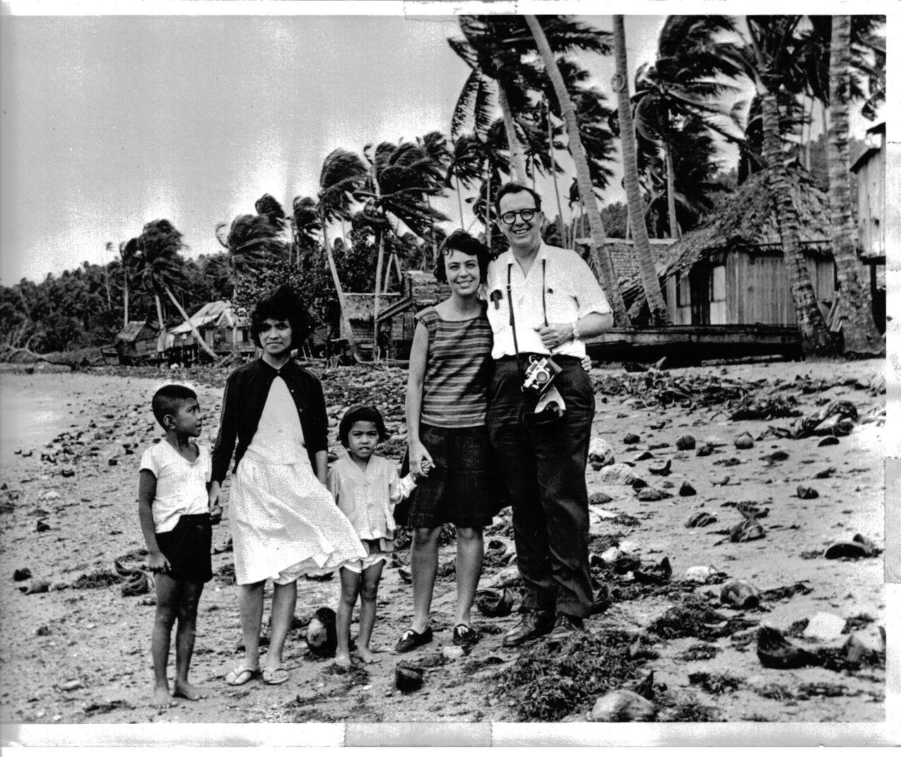 (Rt. to Lft.) Pam Benson with her father Jeffery Cohelan, and members of her host family. Barrio Inaclagan, Philippines.