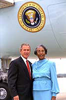 President George W. Bush met Lucille Woods upon arrival in Milwaukee. Woods helps Milwaukee second graders improve their reading skills through her efforts with the Foster Grandparent program.