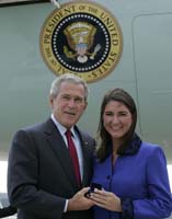 President George W. Bush presented the President’s Volunteer Service Award to Heather Shufelt upon arrival at the airport in Birmingham, Alabama, on Thursday, September 28, 2006.  Shufelt is a volunteer with Hands On Birmingham and a variety of other community organizations. To thank them for making a difference in the lives of others, President Bush honors a local volunteer, called a USA Freedom Corps Greeter, when he travels throughout the United States.  President Bush has met with more than 500 individuals around the country, like Shufelt, since March 2002.