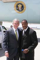 President George W. Bush presented the President’s Volunteer Service Award to Buddy Shannon upon arrival in Wichita, Kansas, on Sunday, May 4, 2008.  Shannon is a volunteer with Real Men, Real Heroes, Saint Mark United Methodist Church and Kansas Big Brothers Big Sisters.  To thank them for making a difference in the lives of others, President Bush honors a local volunteer when he travels throughout the United States.  He has met with more than 600 volunteers, like Shannon, since March, 2002.