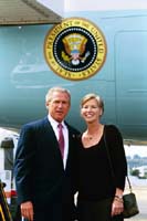 President George W. Bush met Patricia Presson upon arrival in Seattle, Washington, on Friday, August 22, 2003.  For the past two years, Presson has volunteered with the Seattle Police Department’s Victim Support Team.