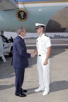 President George W. Bush presented the President’s Volunteer Service Award to Chris Branning, a midshipman at the United States Merchant Marine Academy, upon arrival at the airport in New York, New York, on Monday, June 19, 2006.  To thank them for making a difference in the lives of others, President Bush honors local volunteers, called USA Freedom Corps greeters, when he travels throughout the United States.  President Bush has met with more than 500 individuals around the country, like Branning, since March 2002.