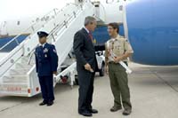 President George W. Bush met Matthew Meyer upon arrival in Mason City, Iowa, on Wednesday, October 20, 2004.  Meyer, 17, led the efforts to create a memorial to firefighters on the grounds of the Mason City Fire Department.