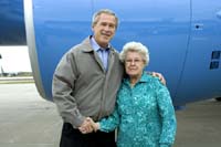 President George W. Bush met Dolores Milbeck upon arrival in Mosinee, Wisconsin, on Thursday, October 7, 2004.  Milbeck, 78, is an active volunteer with the Mount View Health Care Center.