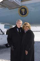 President George W. Bush presented the President’s Volunteer Service Award to Beverly Christy-Wright upon arrival at the airport in Milwaukee, Wisconsin, on Monday, February 20, 2006.  Christy-Wright volunteers with the North Central YMCA’s Black Achievers Program through the Harley-Davidson Motor Company’s employee volunteer program.  To thank them for making a difference in the lives of others, President Bush has met with more than 470 individuals around the country, like Christy-Wright, since March 2002.