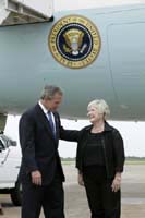 President George W. Bush met Carmen S. Parker upon arrival in Houston, Texas, on Saturday, July 19, 2003. Parker has been an active volunteer in the Houston area for more than 12 years.