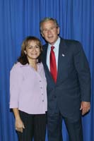 President George W. Bush met Eunice Sanchez upon arrival in Colmar, Pennsylvania, on Thursday, September 9, 2004.  Sanchez is an active volunteer with the Amachi mentoring program in Philadelphia.