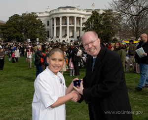 White House Council on Environmental Quality Chairman Jim Connaughton presenting Tammson Joshua with the Presidential Volunteer Service Award USA Freedom Corps photo by M. T. Harmon.