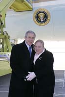 President George W. Bush presented the President’s Volunteer Service Award to Nancy Sager upon arrival in Minneapolis, Minnesota, on Friday, December 9, 2005.  Sager is an AmeriCorps member serving persons with disabilities through the I-Team program at Rise Incorporated in Minneapolis.  To thank them for making a difference in the lives of others, President Bush has met with more than 450 individuals around the country, like Sager, since March 2002.