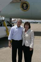 President George W. Bush presented the President’s Volunteer Service Award to Sandi Langley upon departure from the airport in Memphis, Tennessee, on Friday, June 30, 2006.  Langley has been a volunteer with the Memphis Leadership Foundation’s For The Kingdom Camp and Retreat Center and First Evangelical Church.  To thank them for making a difference in the lives of others, President Bush honors a local volunteer, called a USA Freedom Corps greeter, when he travels throughout the United States.  President Bush has met with more than 500 individuals around the country, like Langley, since March 2002.