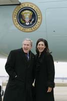 President George W. Bush presented the President’s Volunteer Service Award to Monica Hardin upon arrival in Louisville, Kentucky, on Thursday, March 10, 2005.  Hardin, 23, is an active volunteer with Kentucky Harvest.
