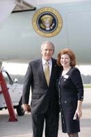 President George W. Bush presented the President’s Volunteer Service Award to Margaret Rose Halbert upon arrival at Dobbins Air Reserve Base in Marietta, Georgia, on Thursday, September 7, 2006.  Halbert is a volunteer with United Service Organizations (USO) Georgia.  To thank them for making a difference in the lives of others, President Bush honors a local volunteer, called a USA Freedom Corps Greeter, when he travels throughout the United States.  President Bush has met with more than 500 individuals around the country, like Halbert, since March 2002.