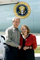 President George W. Bush met Marj Kamrath upon arrival in Sioux City, Iowa, on Saturday, August 14, 2004.  Kamrath is an active volunteer with the Food Bank of Siouxland. 
