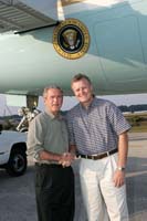 President George W. Bush met Dr. Larry Smith upon arrival in Gainesville, Florida, on Sunday, October 31, 2004.  Smith, 49, is an active volunteer with the Boys and Girls Club of Northwest Gainesville.