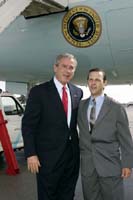 President George W. Bush met Eric Vaz upon arrival in Miami, Florida, on Sunday, October 31, 2004.  Vaz, 41, is the volunteer chairman of disaster services for the American Red Cross of Greater Miami & The Keys.