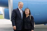 President George W. Bush met Lan Phamwhen upon arrival in Tampa, Florida, on Friday, July 16, 2004. Pham is an active volunteer with the Catholic Charities Diocese of St. Petersburg.