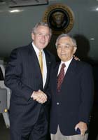 President George W. Bush presented the President’s Volunteer Service Award to Dr. Mas Kamigaki upon arrival at the airport in Stockton, California, on Monday, October 2, 2006.  Kamigaki is a volunteer with CareVan, a program of St. Joseph’s Medical Center, St. Mary’s Interfaith Community Services, and the Stockton Rotary Club.  To thank them for making a difference in the lives of others, President Bush honors a local volunteer, called a USA Freedom Corps Greeter, when he travels throughout the United States.  President Bush has met with more than 500 individuals around the country, like Kamigaki, since March 2002.