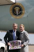 President George W. Bush presented the President’s Volunteer Service Award to Lindsey Allen upon arrival in Shreveport, Louisiana, on Friday, March 11, 2005.  Allen, 22, is an active volunteer with Hospice of Shreveport/Bossier.