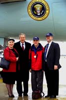 President George W. Bush met Larry, Linda and Eric Swartz upon arrival in Springfield, Illinois, on Sunday, November 3. The Swartz family is a supporter of the Special Olympics. 