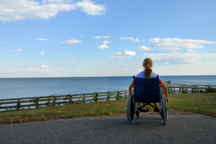 Girl in Wheelchair Overlooking Ocean