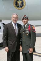 President George W. Bush presented the President’s Volunteer Service Award to Daniel Middaugh, 16, upon arrival at the airport in Tampa, Florida, on Tuesday, May, 1, 2007.  Middaugh is a volunteer with a variety of community organizations.  To thank them for making a difference in the lives of others, President Bush honors a local volunteer when he travels throughout the United States.  President Bush has met with more than 575 individuals around the country, like Middaugh, since March 2002.