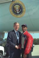 President George W. Bush met with Gustavius "Gus" Philander Samuel, Jr., a local high school student who has been active with the Salvation Army Boys and Girls Club upon arrival in Greenville, South Carolina tomorrow. President Bush recognized Samuel as an example of the lifetime commitment to service he is hoping to instill in all  Americans.