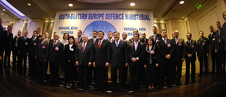 Defense Secretary Robert M. Gates, seventh from the left, joins other representatives attending the 12th annual meeting of the Southeast Europe Defense Ministerial in Kyiv, Ukraine, for a group photo on Oct. 22, 2007. The 11-member SEDM alliance includes Albania, Bulgaria, Croatia, Greece, Italy, Macedonia, Romania, Slovenia, Turkey, Ukraine and the United States. Defense Dept. photo by Cherie A. Thurlby