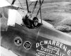 Louise Thaden waving from plane after winning race