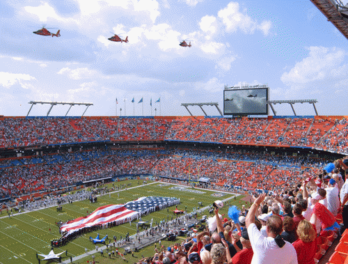 Three HH-65 Dolphin helicopters flyover at Dolphins Stadium in Miami. 