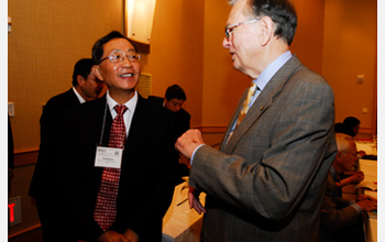 Photo of Jiaquang Sun of the National Natural Science Foundation and NSF Director Arden Bement.